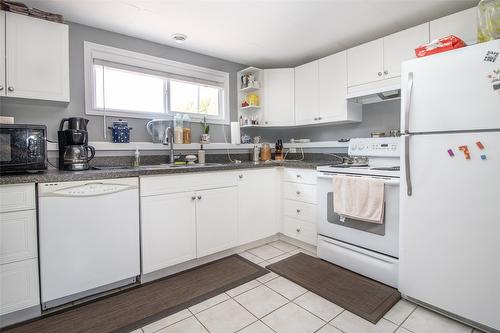 1310 Mary Court, Kelowna, BC - Indoor Photo Showing Kitchen With Double Sink