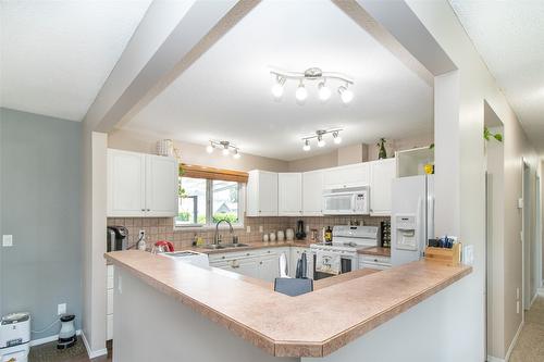 1310 Mary Court, Kelowna, BC - Indoor Photo Showing Kitchen With Double Sink