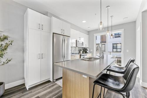 304-11581 Rogers Road, Lake Country, BC - Indoor Photo Showing Kitchen With Double Sink With Upgraded Kitchen