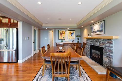 1501 18 Avenue, Salmon Arm, BC - Indoor Photo Showing Dining Room With Fireplace