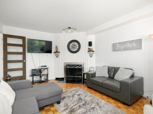 Den - 3475 Rue De Lausanne, Terrebonne (Terrebonne), QC - Indoor Photo Showing Living Room With Fireplace