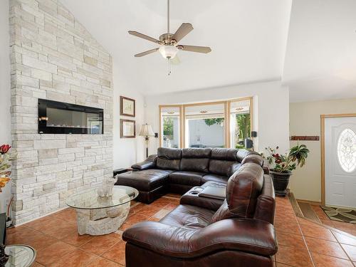 Living room - 3475 Rue De Lausanne, Terrebonne (Terrebonne), QC - Indoor Photo Showing Living Room With Fireplace