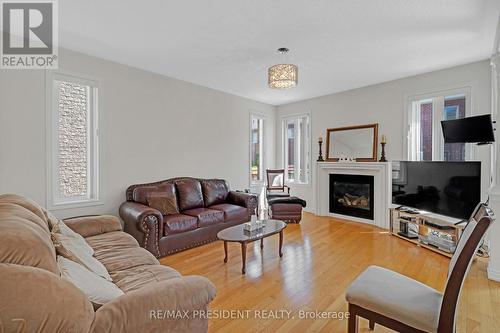 7 Wellpark Way, Brampton (Bram East), ON - Indoor Photo Showing Living Room With Fireplace