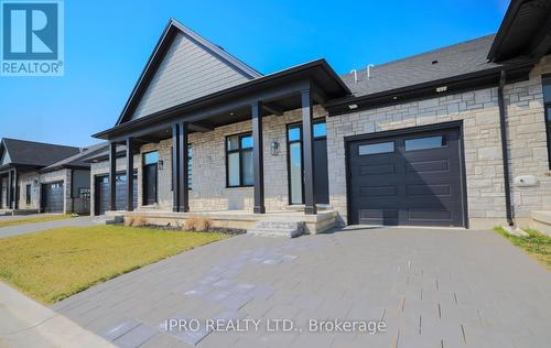 7 - 63 Compass Trail, Central Elgin (Port Stanley), ON - Outdoor With Facade