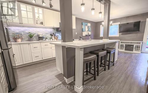 7 - 63 Compass Trail, Central Elgin (Port Stanley), ON - Indoor Photo Showing Kitchen With Upgraded Kitchen