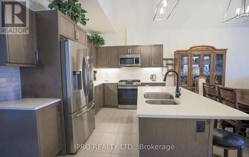 7 - 63 Compass Trail, Central Elgin, ON - Indoor Photo Showing Kitchen With Double Sink With Upgraded Kitchen