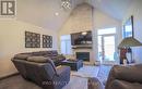 7 - 63 Compass Trail, Central Elgin, ON  - Indoor Photo Showing Living Room With Fireplace 