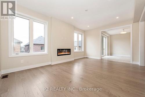 78 Bearberry Road, Springwater (Midhurst), ON - Indoor Photo Showing Living Room With Fireplace