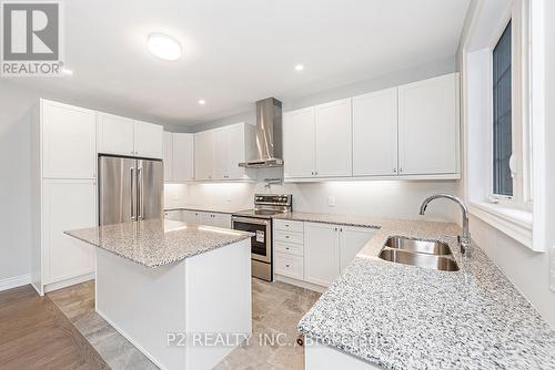 49 Periwinkle Road, Springwater (Midhurst), ON - Indoor Photo Showing Kitchen With Double Sink With Upgraded Kitchen