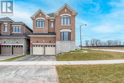 49 Periwinkle Road, Springwater (Midhurst), ON - Outdoor With Facade