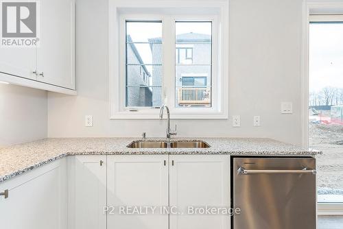 49 Periwinkle Road, Springwater (Midhurst), ON - Indoor Photo Showing Kitchen With Double Sink