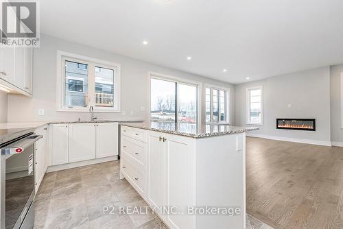 49 Periwinkle Road, Springwater (Midhurst), ON - Indoor Photo Showing Kitchen With Upgraded Kitchen