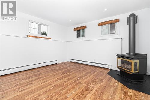 12 Diefenbaker Street, St John'S, NL - Indoor Photo Showing Other Room With Fireplace