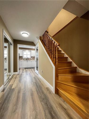 Entry hall view of kitchen and stairs - 407 Melanie Crescent, Ancaster, ON - Indoor Photo Showing Other Room