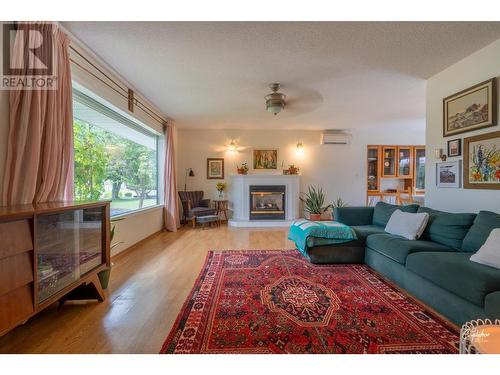 6204 York Road, Grand Forks, BC - Indoor Photo Showing Living Room With Fireplace