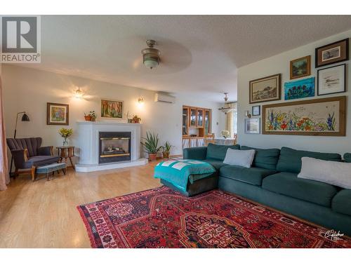 6204 York Road, Grand Forks, BC - Indoor Photo Showing Living Room With Fireplace