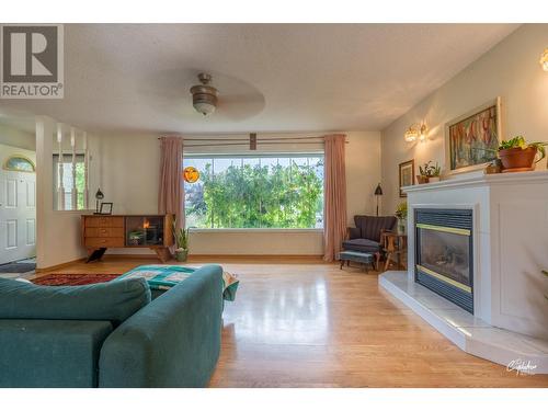 6204 York Road, Grand Forks, BC - Indoor Photo Showing Living Room With Fireplace