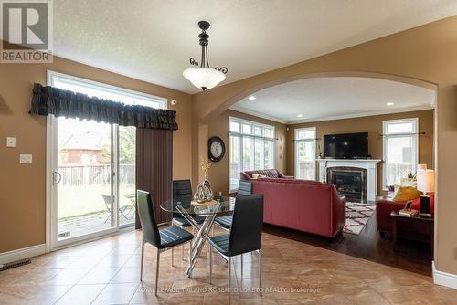 1873 Kirkpatrick Way, London, ON - Indoor Photo Showing Dining Room With Fireplace