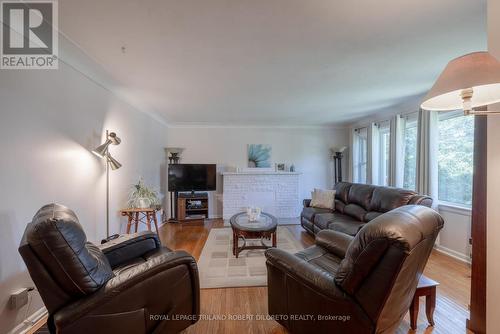 22756 Komoka Road, Middlesex Centre (Komoka), ON - Indoor Photo Showing Living Room With Fireplace