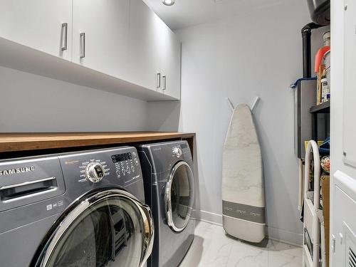 Laundry room - 5-319 Rue De L'Aigle, Carignan, QC - Indoor Photo Showing Laundry Room