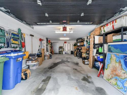 Garage - 5-319 Rue De L'Aigle, Carignan, QC - Indoor Photo Showing Garage