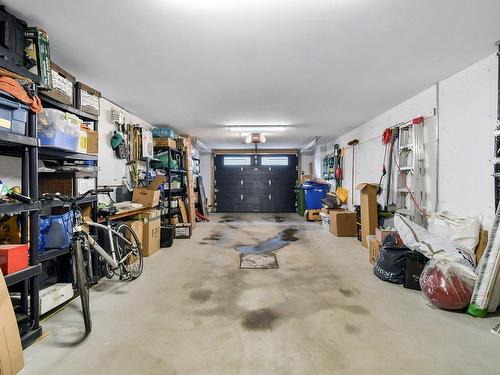 Garage - 5-319 Rue De L'Aigle, Carignan, QC - Indoor Photo Showing Garage