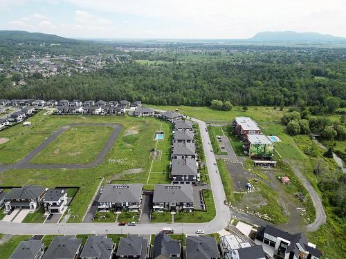 Photo aÃ©rienne - 5-319 Rue De L'Aigle, Carignan, QC - Outdoor With View