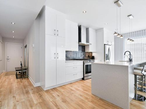 Kitchen - 5-319 Rue De L'Aigle, Carignan, QC - Indoor Photo Showing Kitchen With Upgraded Kitchen