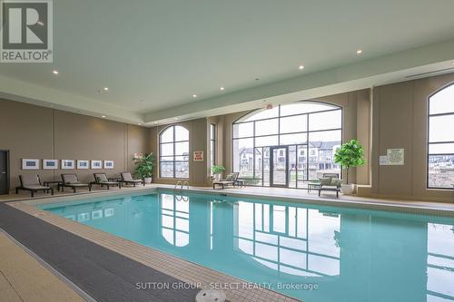 1110 - 240 Villagewalk Boulevard, London, ON - Indoor Photo Showing Other Room With In Ground Pool