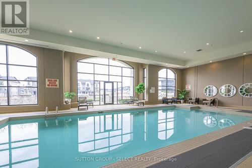 1110 - 240 Villagewalk Boulevard, London, ON - Indoor Photo Showing Other Room With In Ground Pool