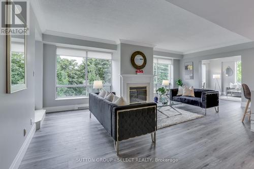 309 - 250 Sydenham Street, London, ON - Indoor Photo Showing Living Room With Fireplace