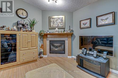 77 Simms Court, London, ON - Indoor Photo Showing Living Room With Fireplace