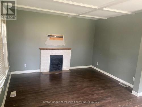 42 Vauxhall Street, London, ON - Indoor Photo Showing Other Room With Fireplace