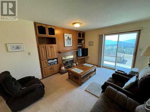 210 Winnipeg Avenue, Grand Forks, BC - Indoor Photo Showing Living Room With Fireplace