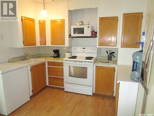 117 Churchill Avenue, Coronach, SK - Indoor Photo Showing Kitchen With Double Sink