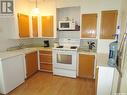 117 Churchill Avenue, Coronach, SK  - Indoor Photo Showing Kitchen With Double Sink 