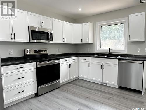 1241 98Th Street, North Battleford, SK - Indoor Photo Showing Kitchen With Stainless Steel Kitchen With Double Sink