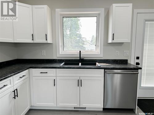 1241 98Th Street, North Battleford, SK - Indoor Photo Showing Kitchen With Double Sink