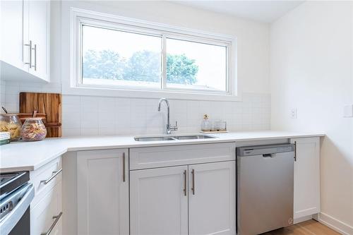 72 Woodman Drive N, Hamilton, ON - Indoor Photo Showing Kitchen With Double Sink