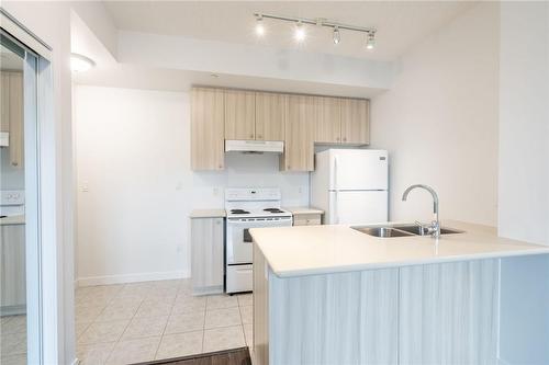 90 Charlton Avenue W|Unit #308, Hamilton, ON - Indoor Photo Showing Kitchen With Double Sink