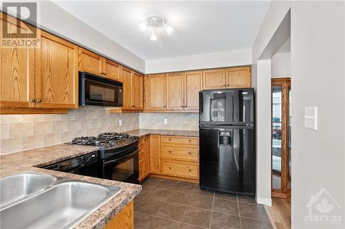 313 Silbrass Private, Ottawa, ON - Indoor Photo Showing Kitchen With Double Sink