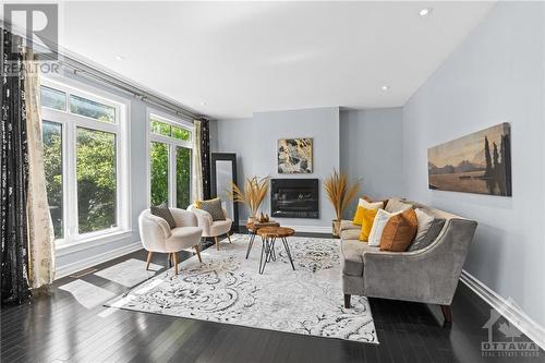 2560 Half Moon Bay Road, Ottawa, ON - Indoor Photo Showing Living Room With Fireplace