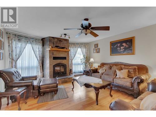 323 Mcpherson Place, Prince George, BC - Indoor Photo Showing Living Room With Fireplace