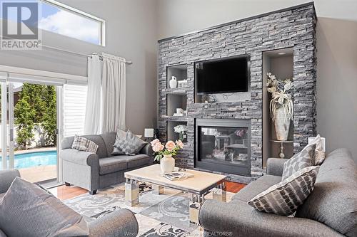 1091 Woodland, Lakeshore, ON - Indoor Photo Showing Living Room With Fireplace