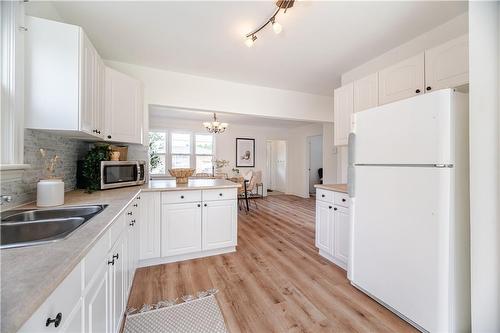 344 East 12Th Street, Hamilton, ON - Indoor Photo Showing Kitchen With Double Sink