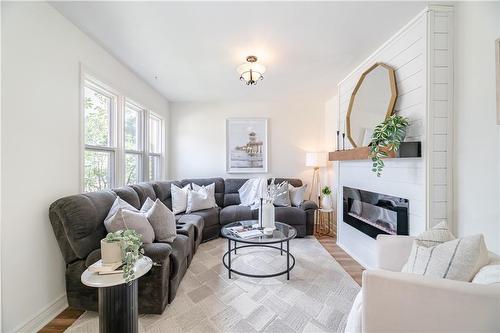 344 East 12Th Street, Hamilton, ON - Indoor Photo Showing Living Room With Fireplace