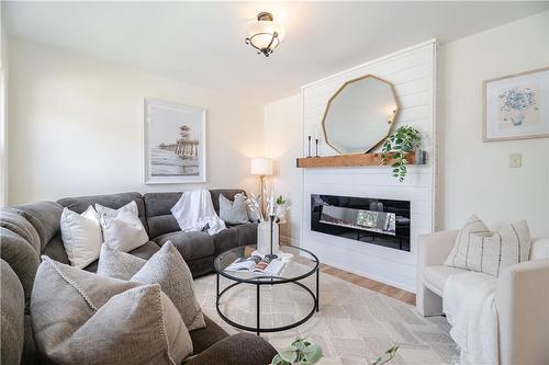 344 East 12Th Street, Hamilton, ON - Indoor Photo Showing Living Room With Fireplace