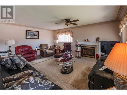 2 Royal Ann Court Unit# 10, Osoyoos, BC - Indoor Photo Showing Living Room With Fireplace