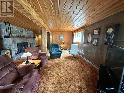 466 Grenfell Road, Timiskaming Remote Area, ON - Indoor Photo Showing Living Room With Fireplace