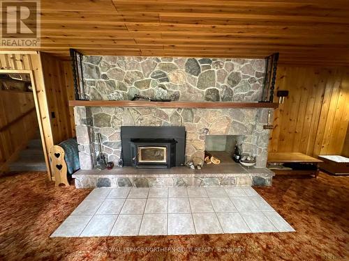 466 Grenfell Road, Timiskaming Remote Area, ON - Indoor Photo Showing Living Room With Fireplace